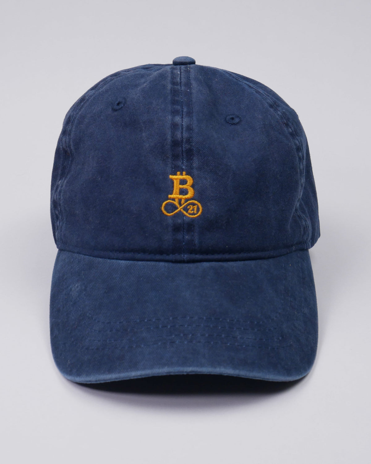 Washed Bitcoin cap made from organic cotton in blue, front view, studio shot