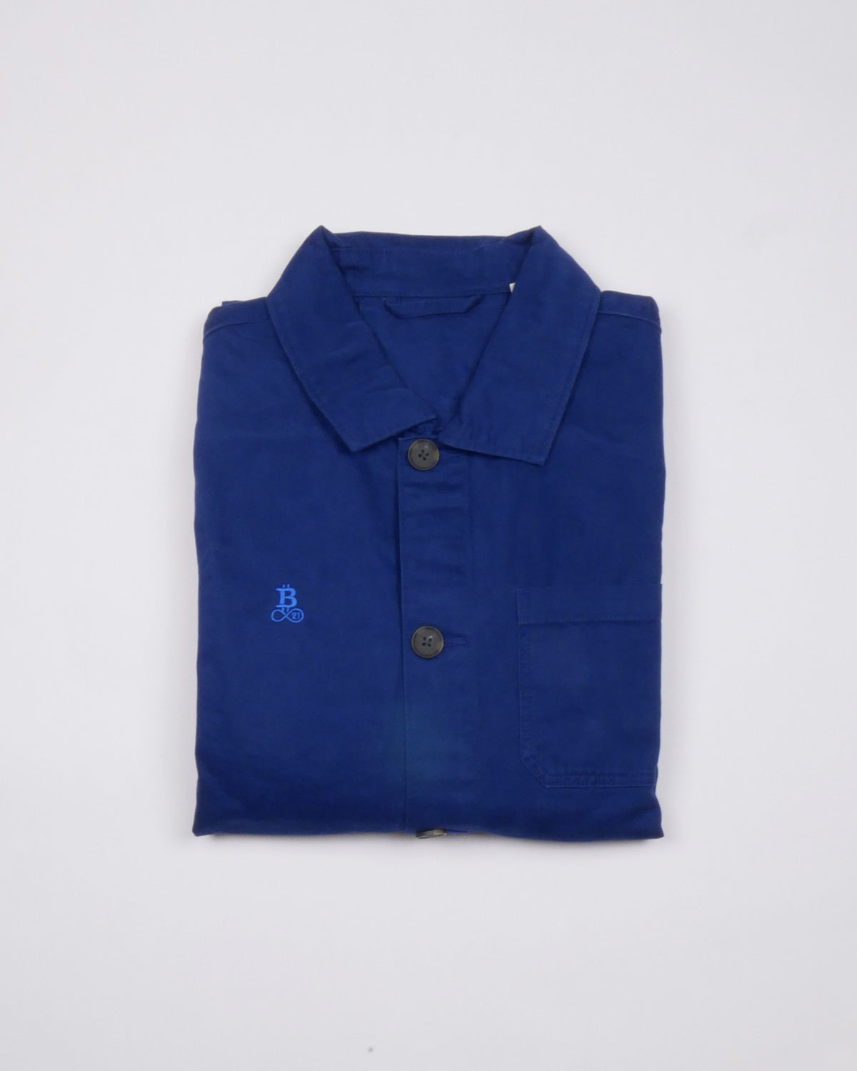 Bitcoin Worker Jacket Privacy in Washed Indigo, folded front view with tone-on-tone embroidered Bitcoin21 logo