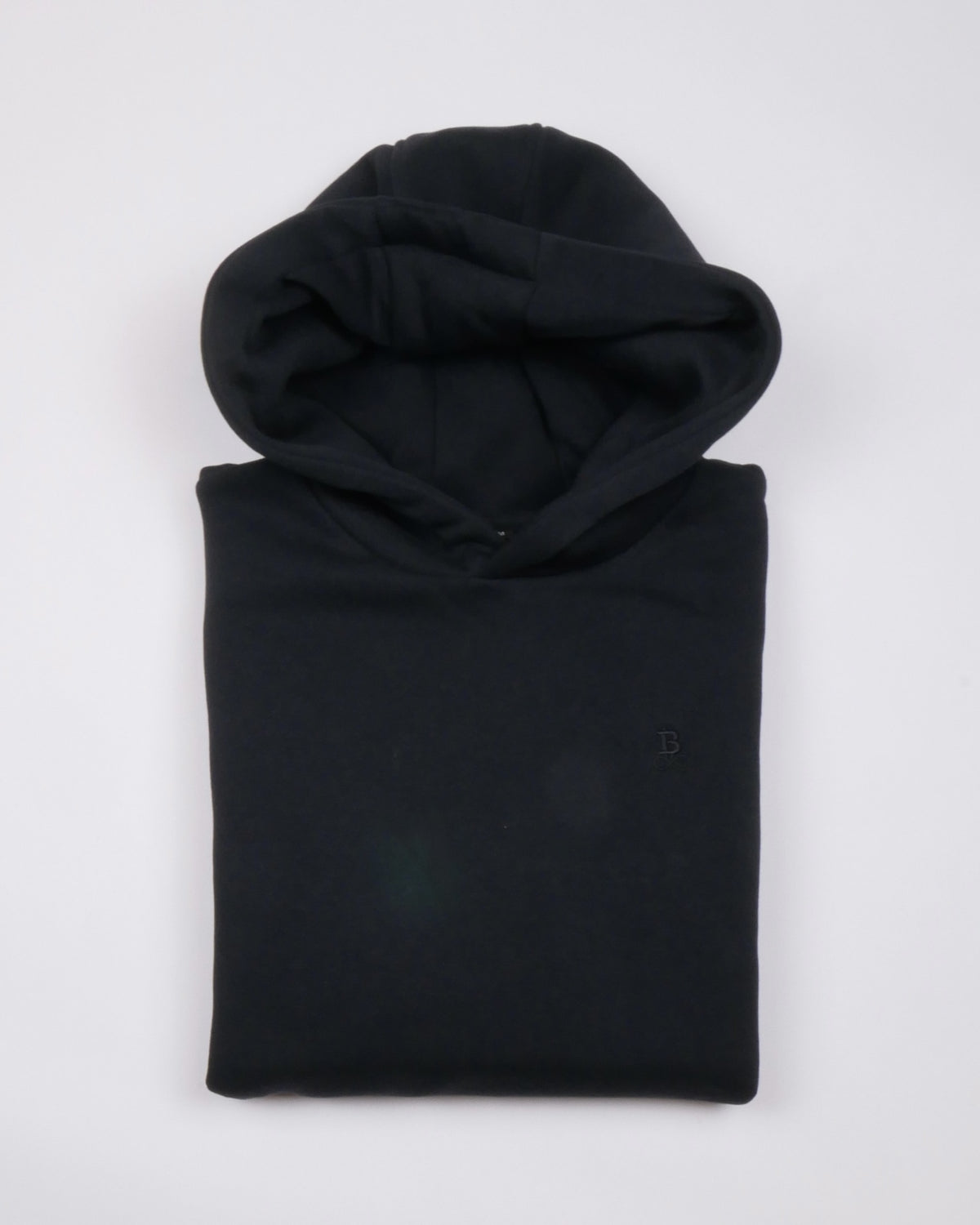 Bitcoin Oversized Hoodie Privacy in Black, folded front view with tone-on-tone embroidered Bitcoin21 logo