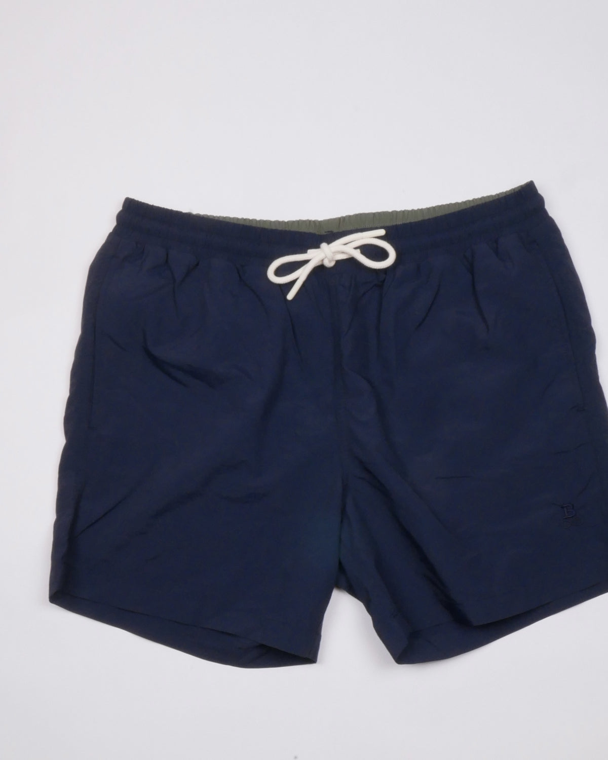 Bitcoin Swim Trunks Privacy in Navy Blue, flat lay front view, tone-on-tone Bitcoin21 logo on the leg