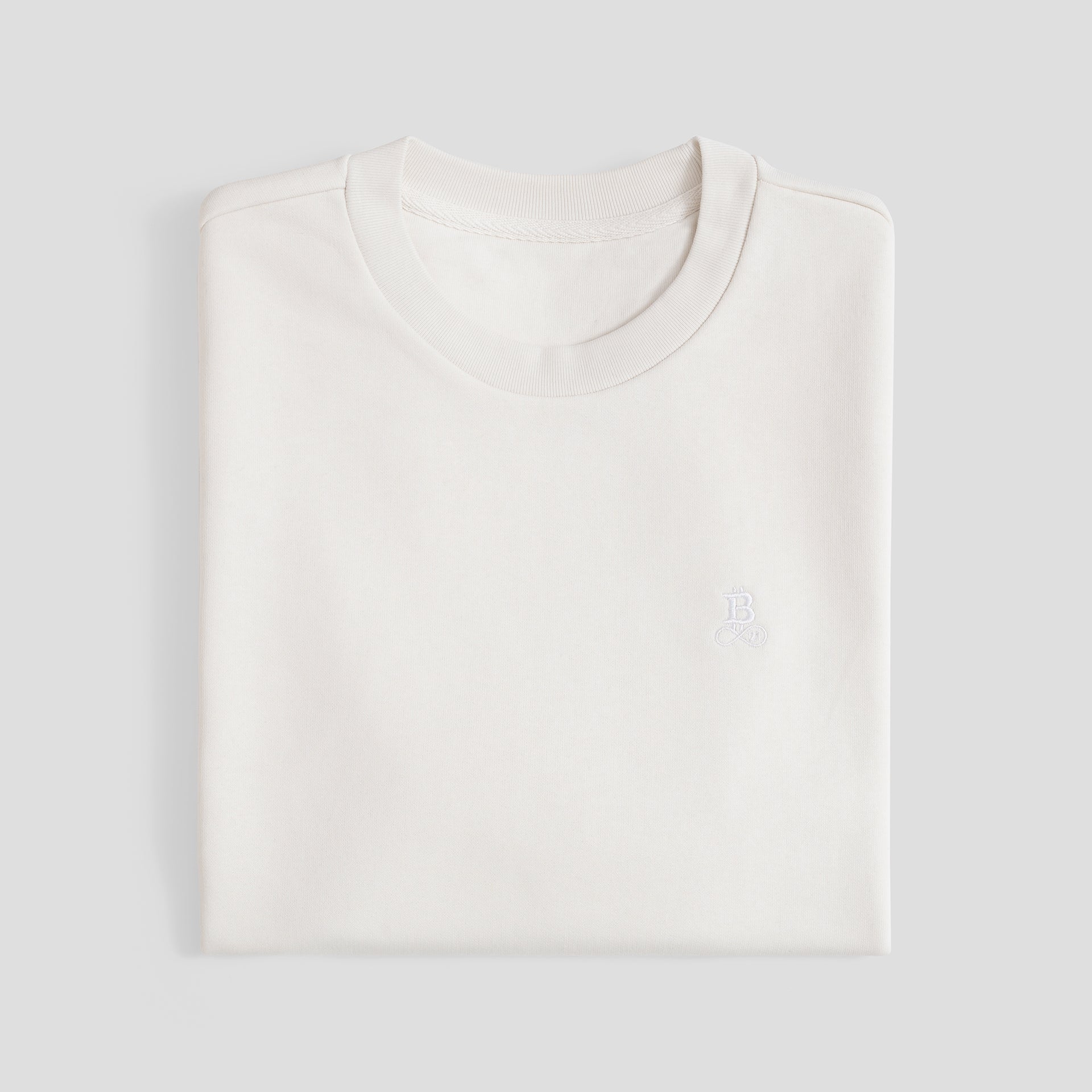 T-shirt Bitcoin Oversize Privacy - Off-White da uomo in cotone pesante con logo Bitcoin21 ricamato tono su tono, t-shirt piegata su fondo chiaro
