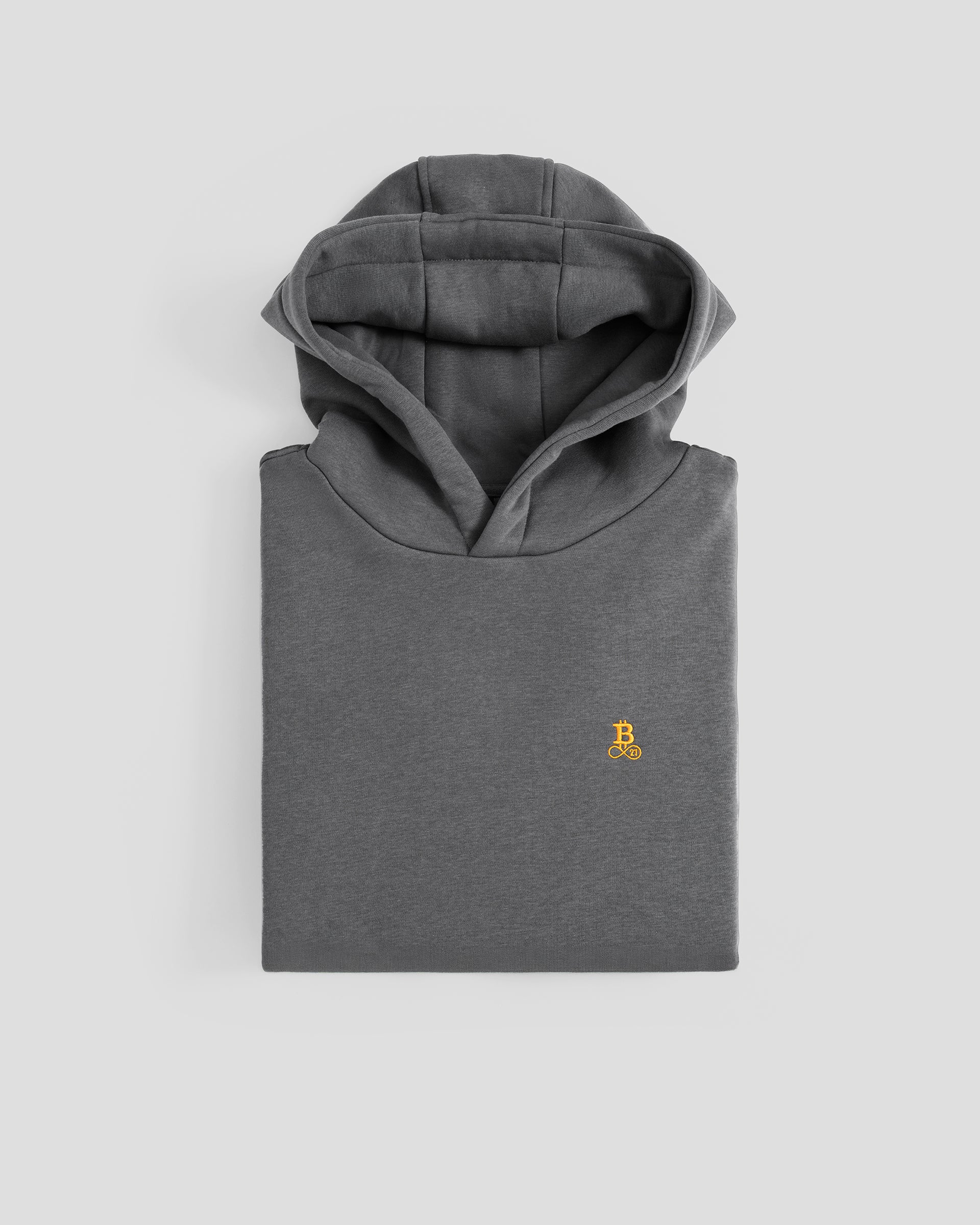 Bitcoin Hoodie oversized grau, zusammengefalteter Hoodie mit sichtbarer Kapuze und orangefarbenem Bitcoin21 Logo vor hellem Hintergrund