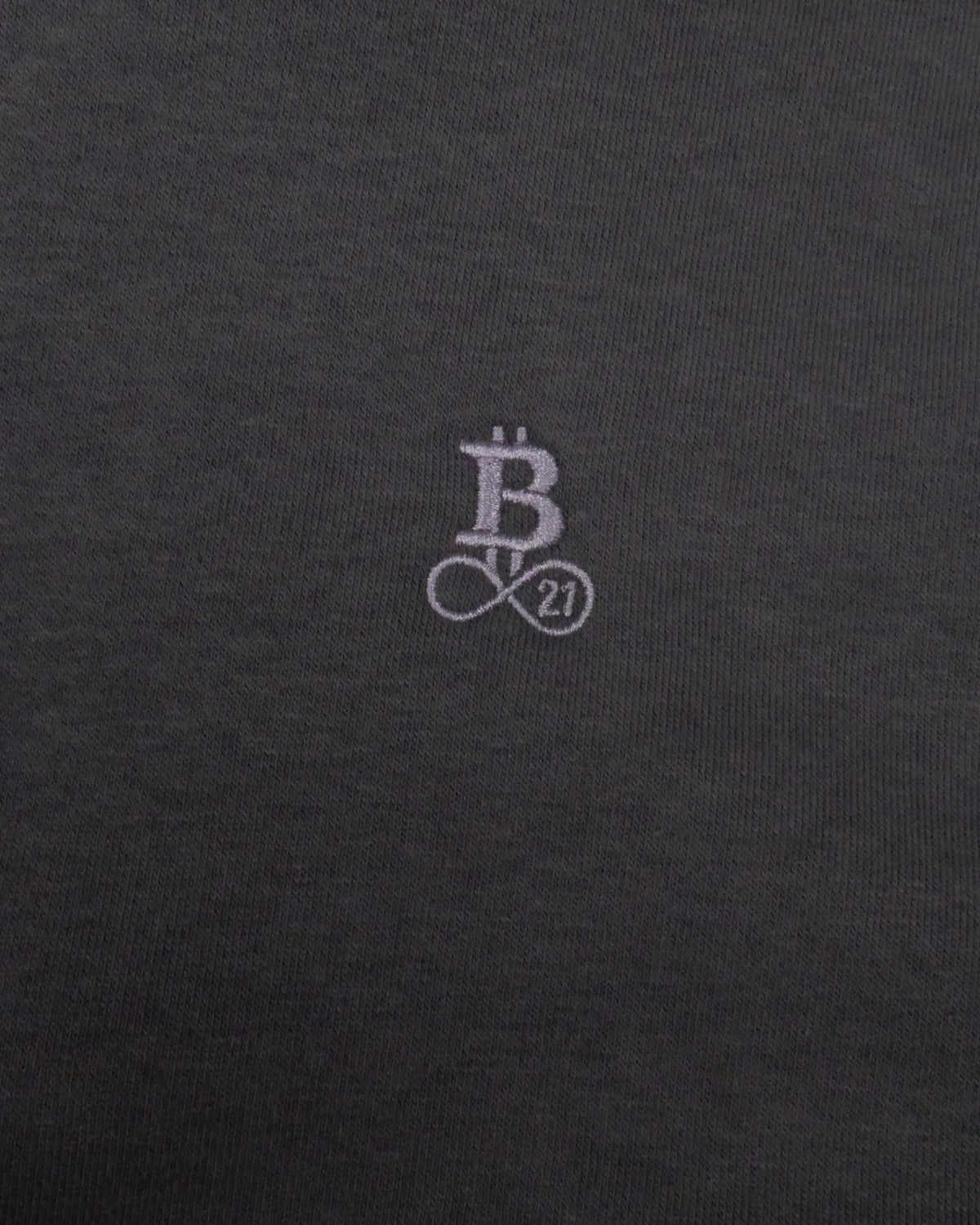 Bitcoin Oversized Hoodie Privacy in Dark Grey, close-up of the tone-on-tone embroidered Bitcoin21 logo