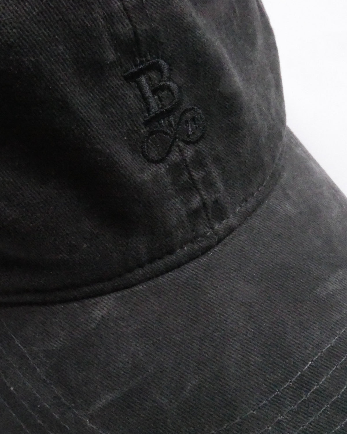 Washed Bitcoin Cap Privacy in Black, close-up of the tone-on-tone embroidered Bitcoin21 logo
