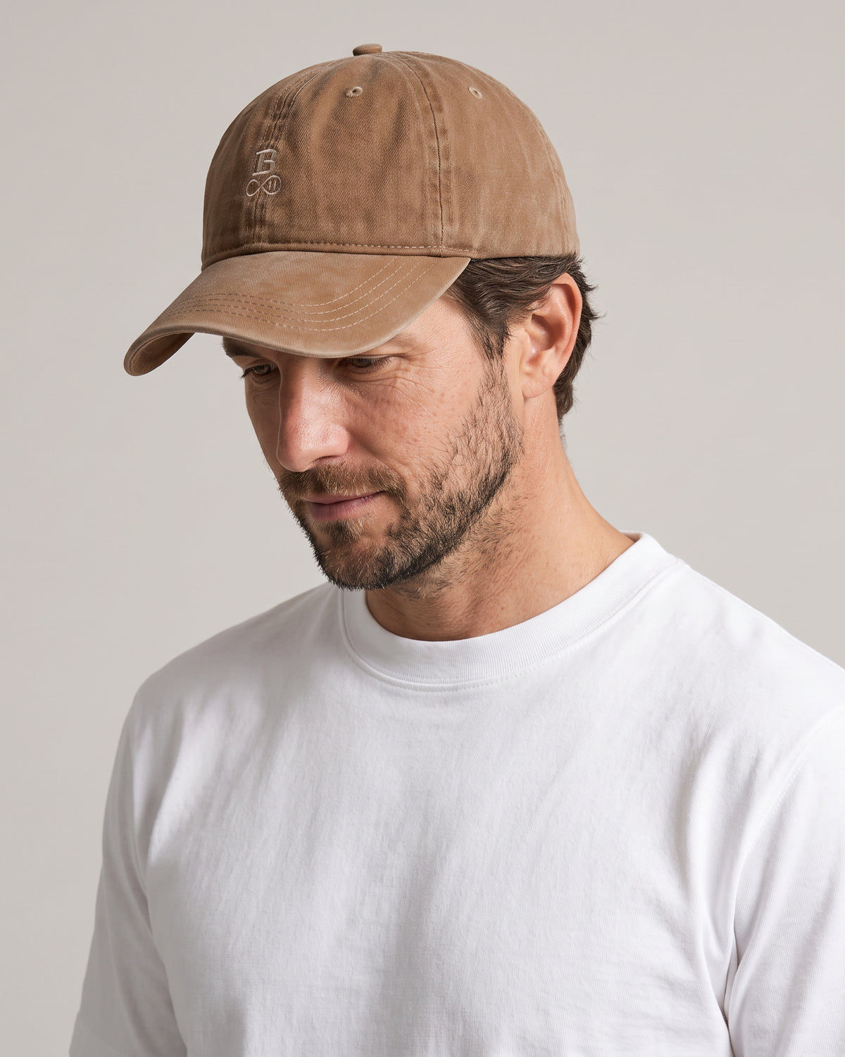Washed Bitcoin Cap Privacy in Dark Camel, worn, front view with tone-on-tone embroidered Bitcoin21 logo