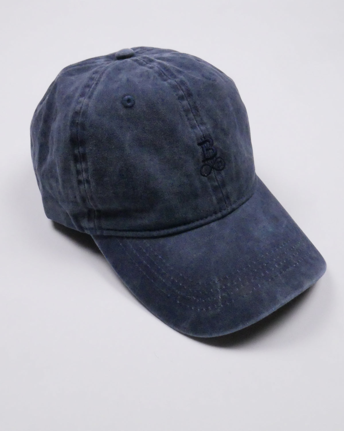 Washed Bitcoin Cap Privacy in Navy Blue, side view with visor and washed cotton