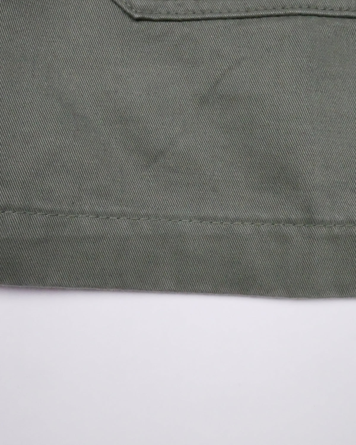 Bitcoin Worker Jacket Privacy in Washed Organic Khaki, detail of the hem