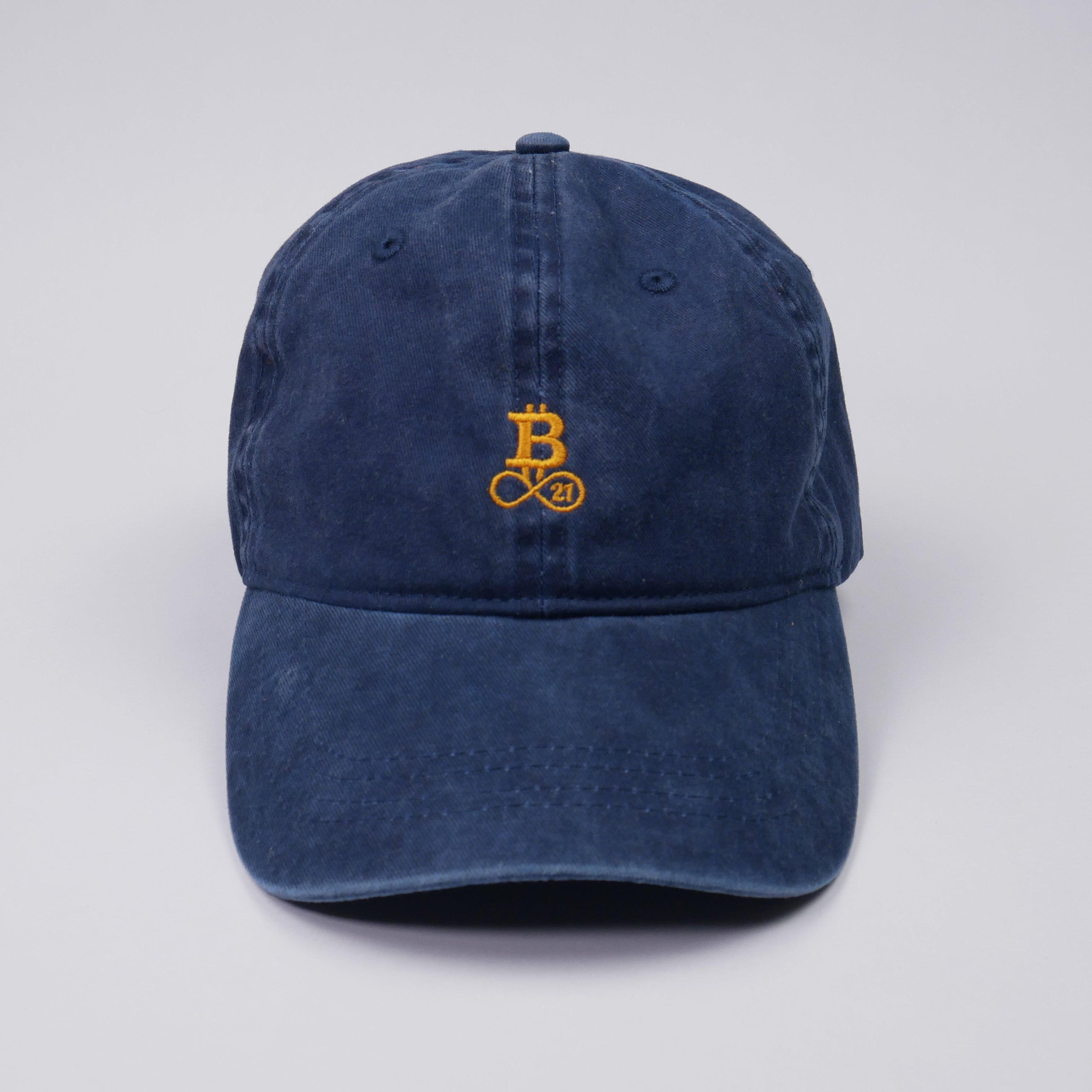 Washed Bitcoin cap made from organic cotton in blue, front view, studio shot