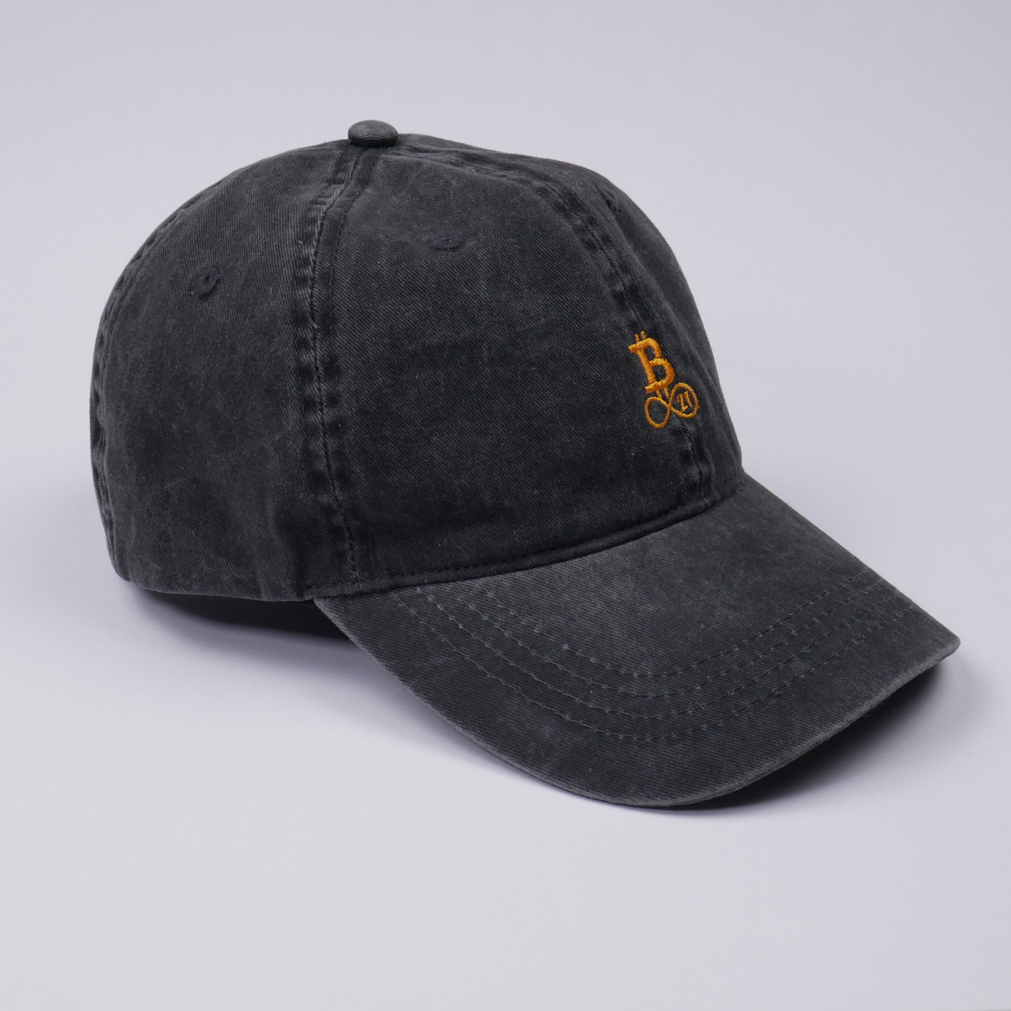 Washed Bitcoin cap made from organic cotton in black, side view, studio shot
