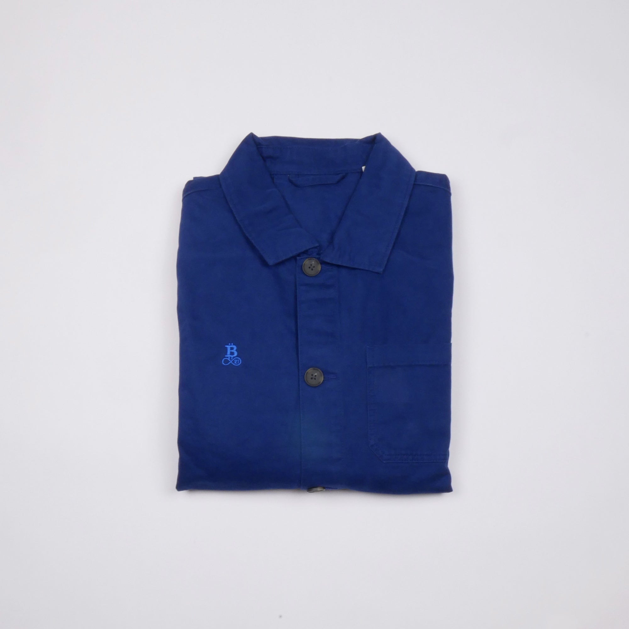 Bitcoin Worker Jacket Privacy in Washed Indigo, folded front view with tone-on-tone embroidered Bitcoin21 logo