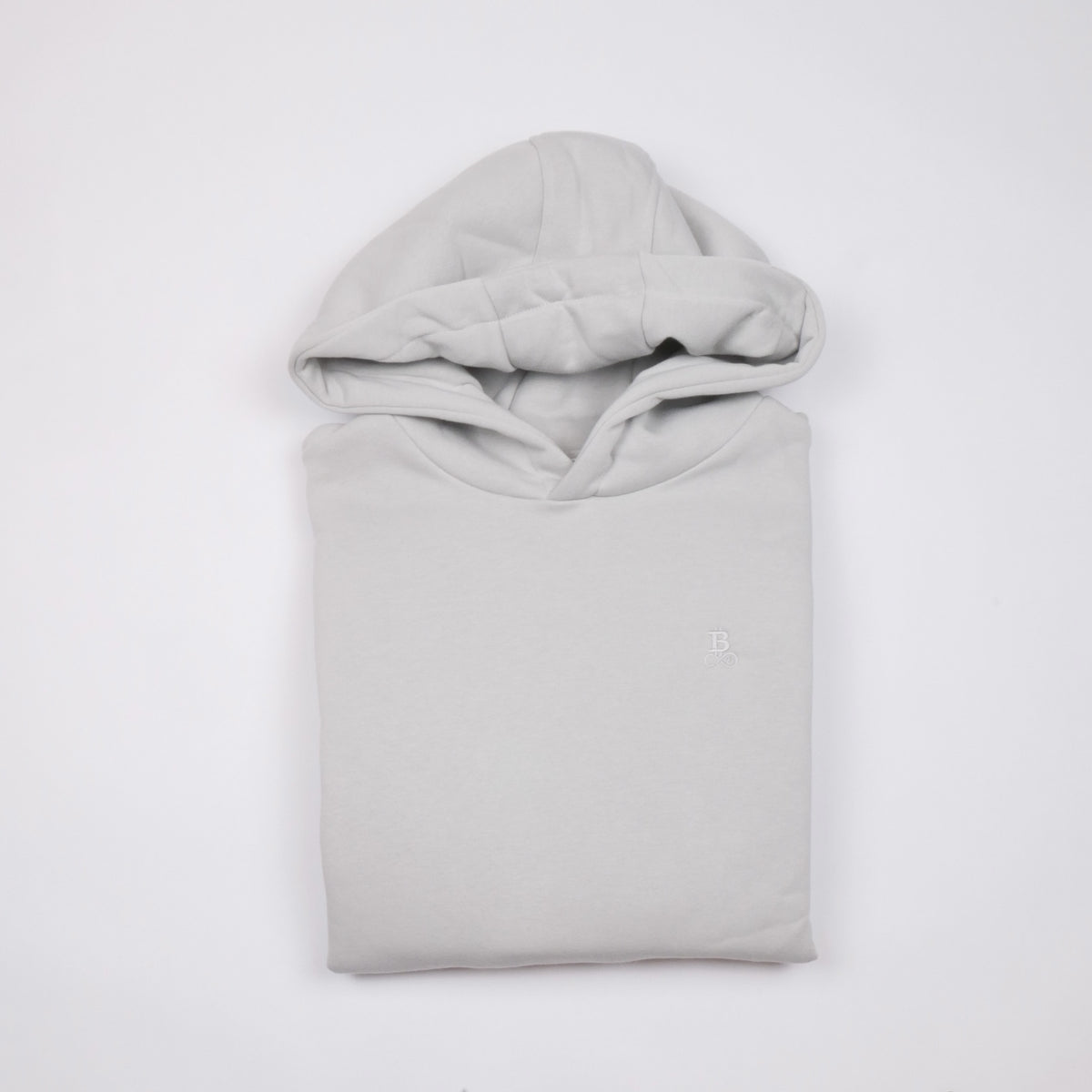Bitcoin Hoodie Oversized Privacy in Hellgrau, gefaltet von vorn mit Ton in Ton gesticktem Bitcoin21-Logo