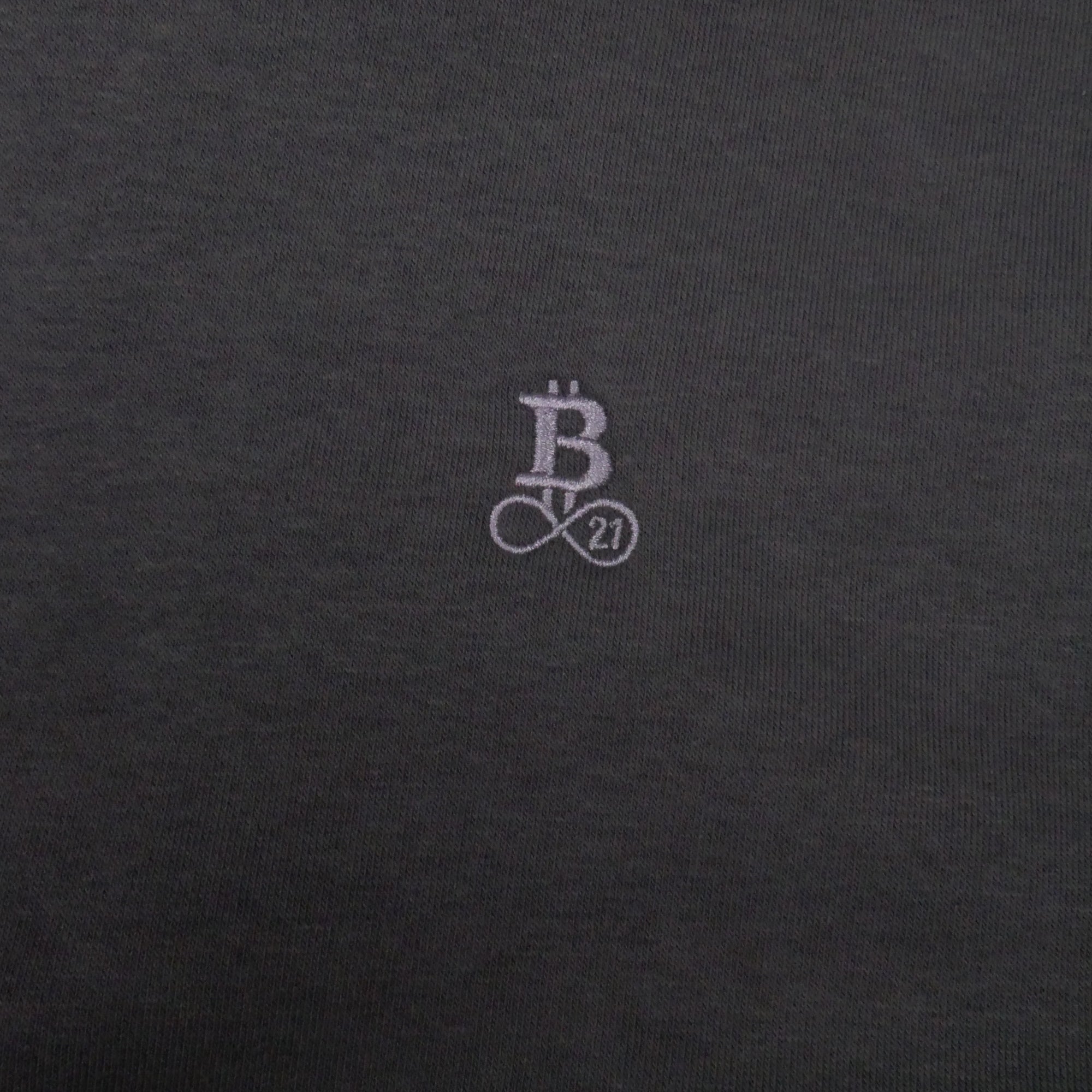 Bitcoin Oversized Hoodie Privacy in Dark Grey, close-up of the tone-on-tone embroidered Bitcoin21 logo