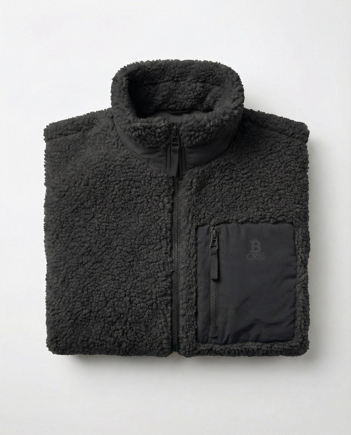 Bitcoin Sherpa Jacket Privacy in Black, folded front view with tone-on-tone printed Bitcoin21 logo on the chest pocket