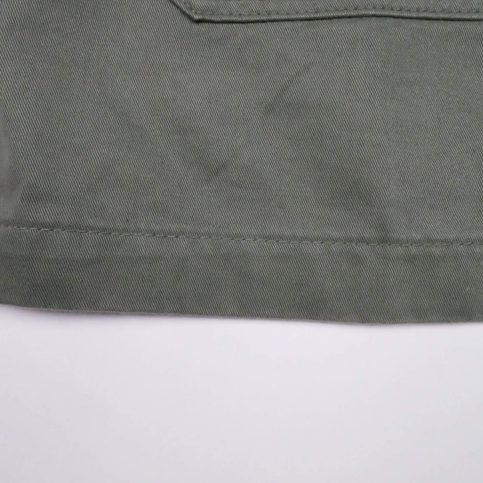 Bitcoin Worker Jacket Privacy in Washed Organic Khaki, detail of the hem