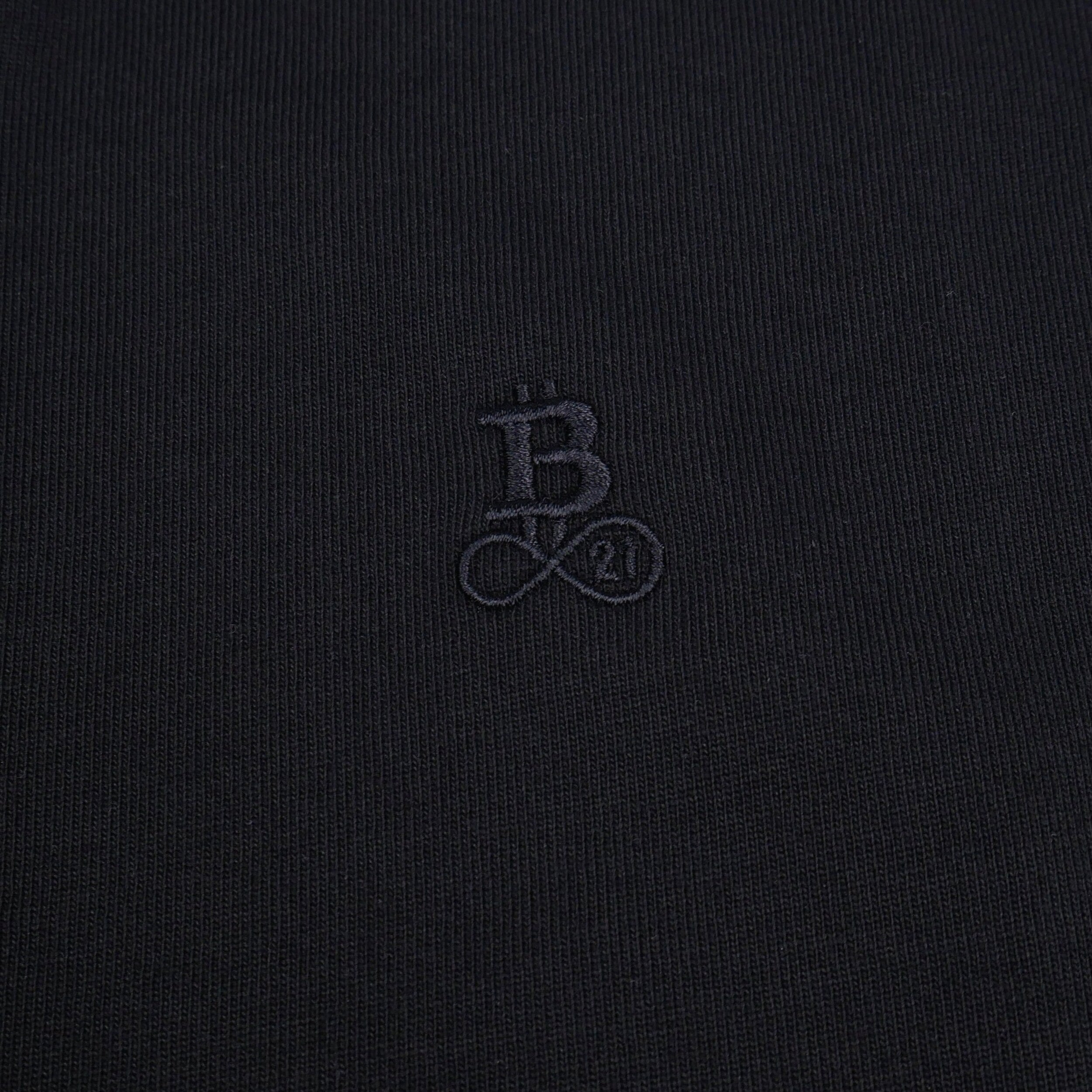 Bitcoin Basic T-Shirt Privacy in black, 100% organic cotton — detail of the tone-on-tone embroidered Bitcoin21 logo